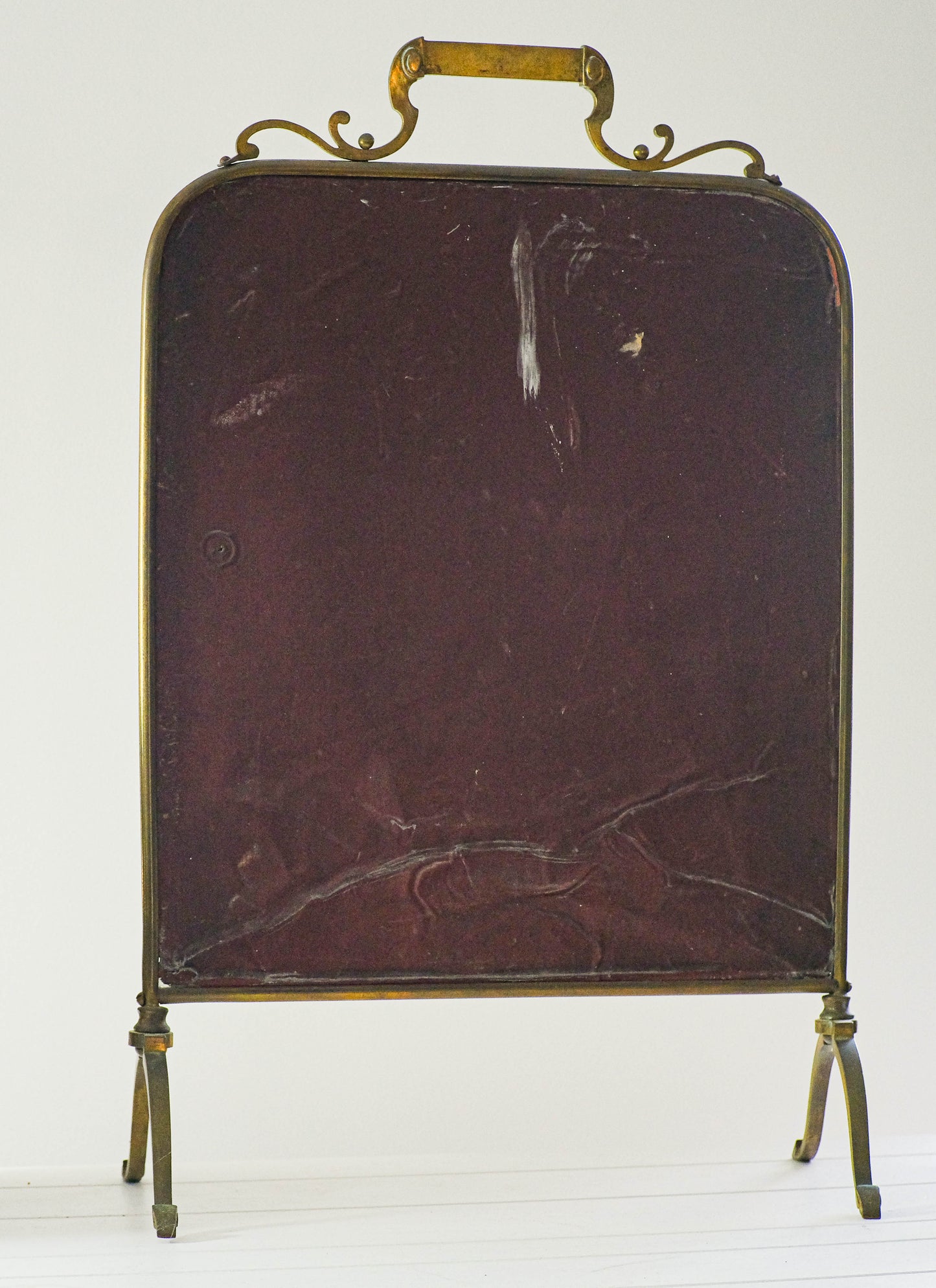 Art Nouveau style Edwardian mirrored brass fire screen.