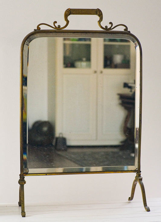 Art Nouveau style Edwardian mirrored brass fire screen.