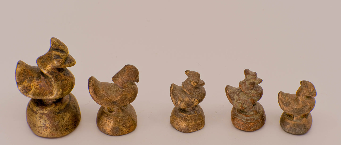 Brass opium weights.