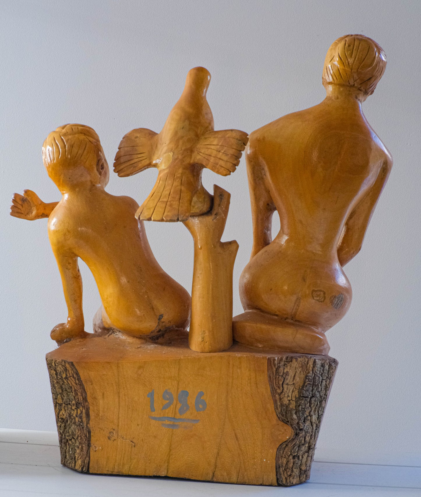 Large folk art piece carved from single block.