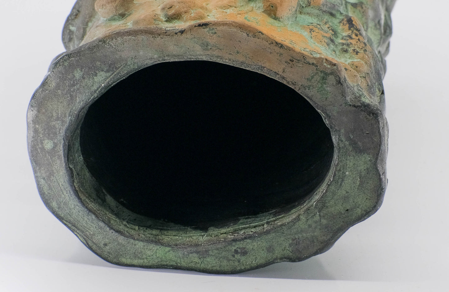 Terracotta verdigris patina Bacchanal vase.